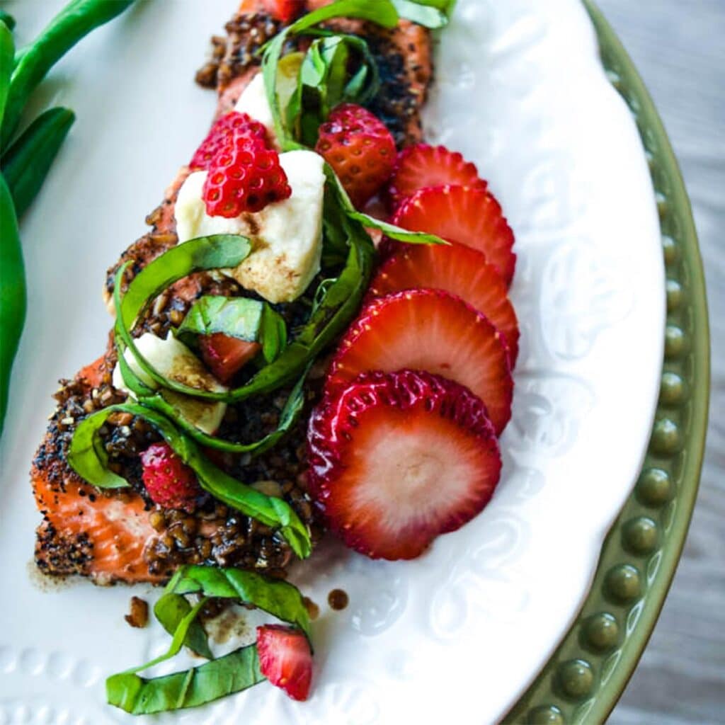 salmon with balsamic glaze, strawberry, basil and goat cheese