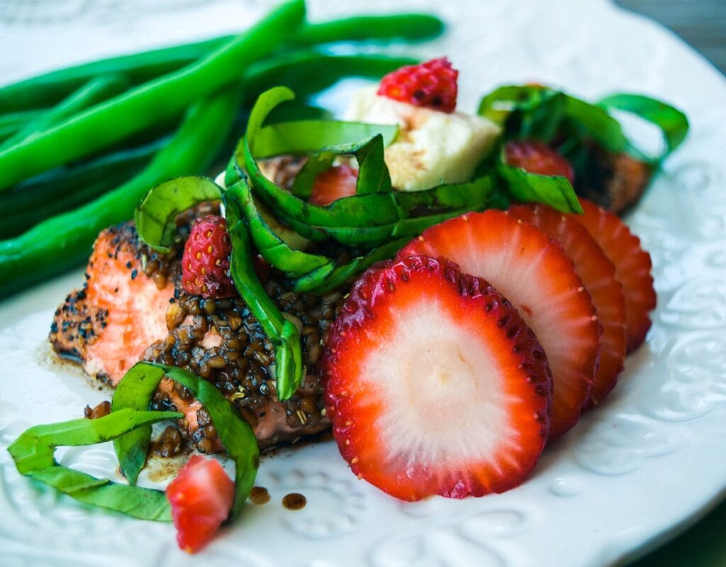 salmon with balsamic glaze, strawberry, basil and goat cheese