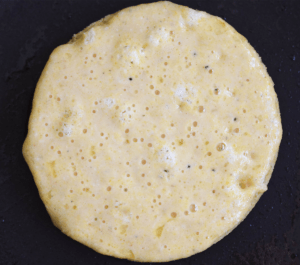 Bubbles forming on pancake ready to be flipped