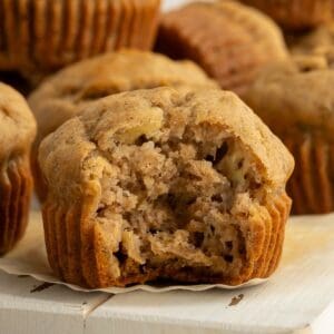 Close up of sugar-free gluten-free banana muffin with a bite out of it.