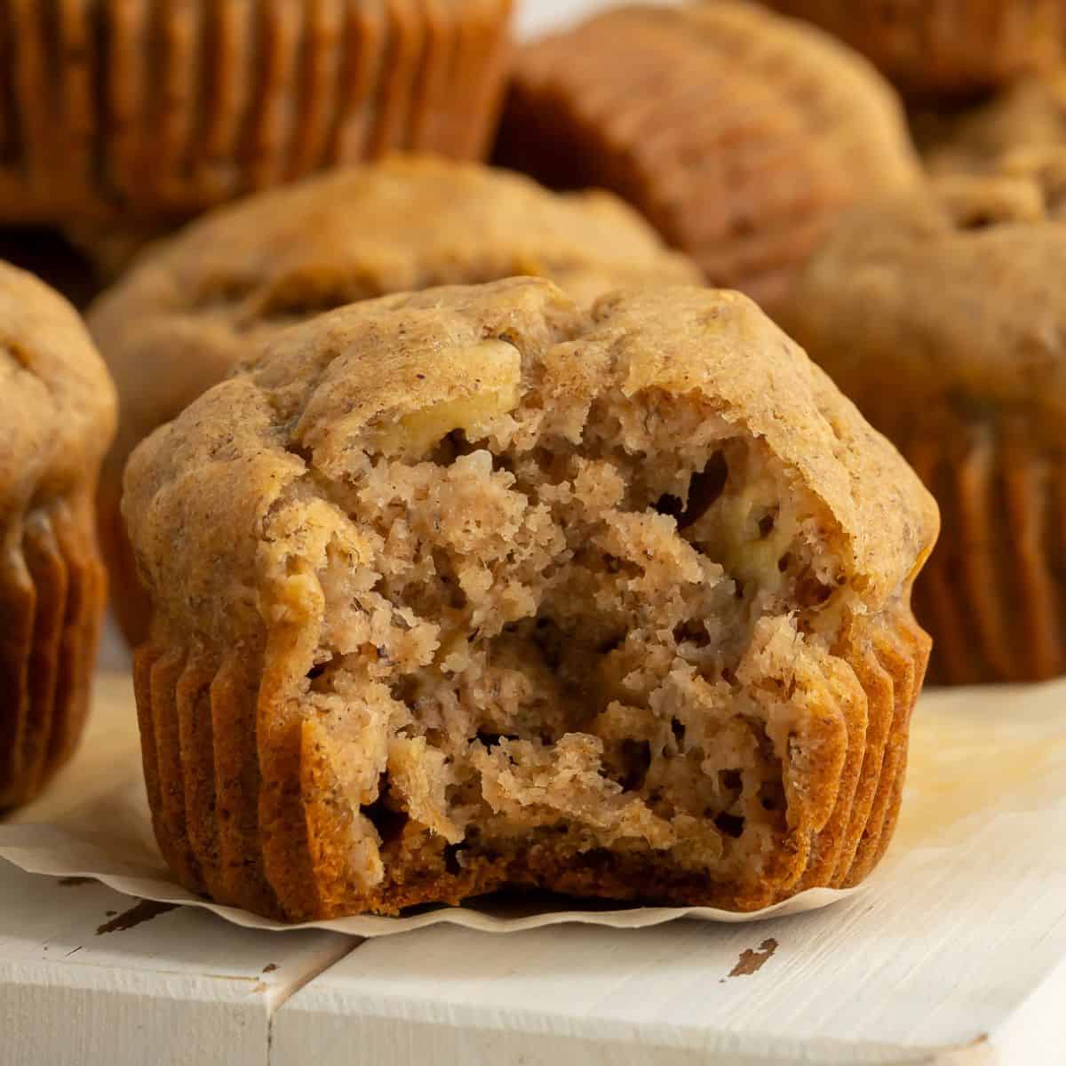 Close up of sugar-free gluten-free banana muffin with a bite out of it.