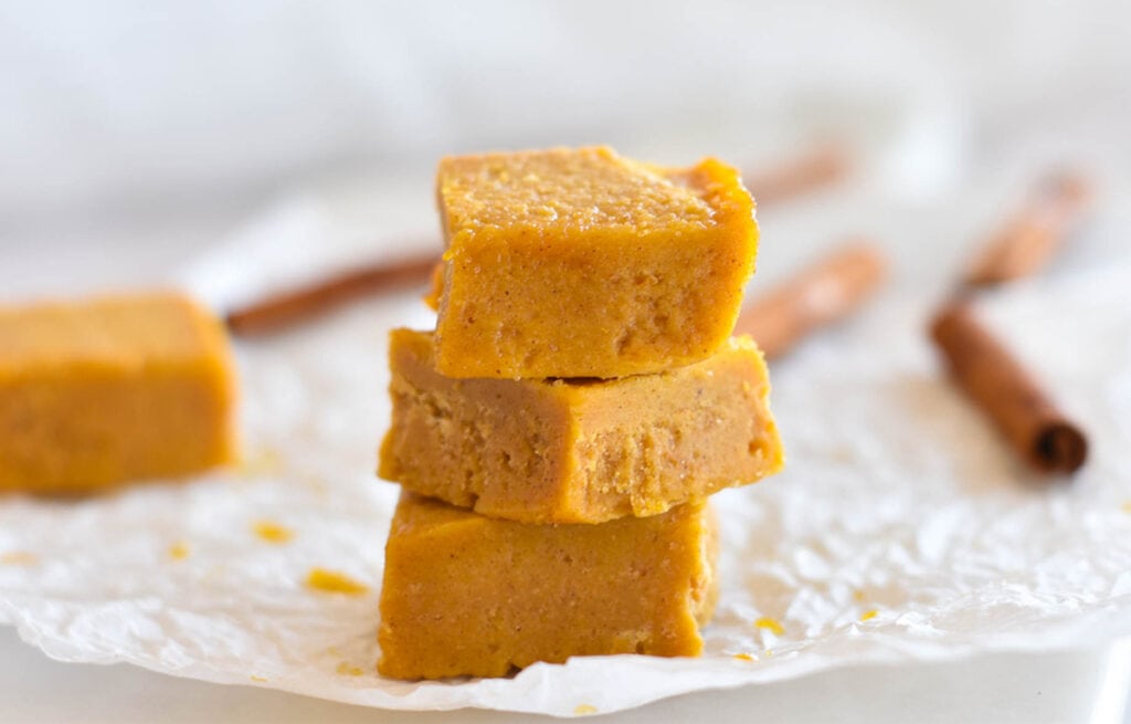 Stack of 3 pieces of fudge with cinnamon