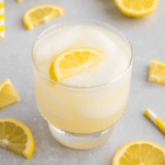 Keto lemonade with monk fruit garnished with lemons.