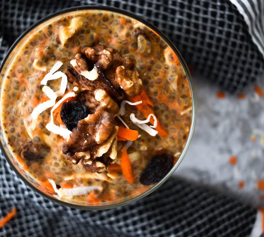 Chia pudding with carrot, pumpkin, raisins, coconut, walnuts and spices.