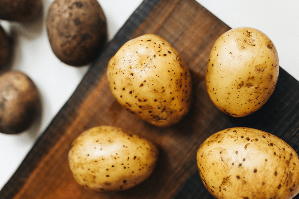 Potatoes on a cutting board