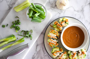 Summer rolls with green onions, garlic, cucumber and peanut sauce