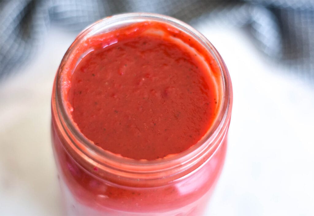 Opened jar of AIP nomato sauce.