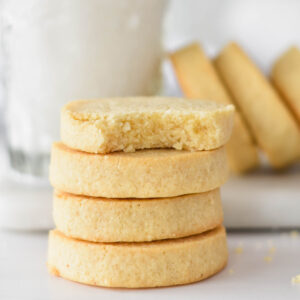 Stack of four buttery keto shortbread cookies.