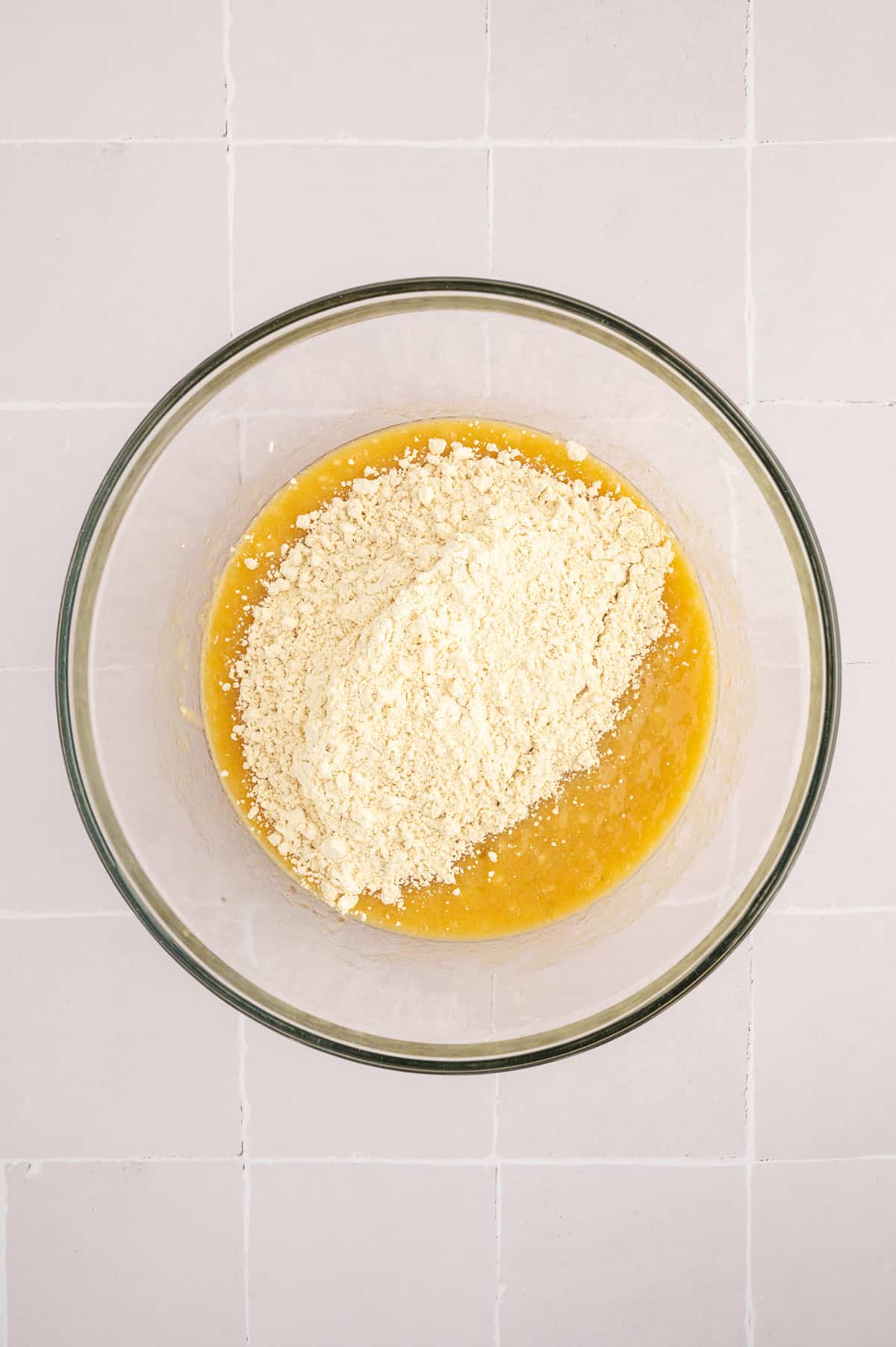 Wet and dry ingredients being mixed together.