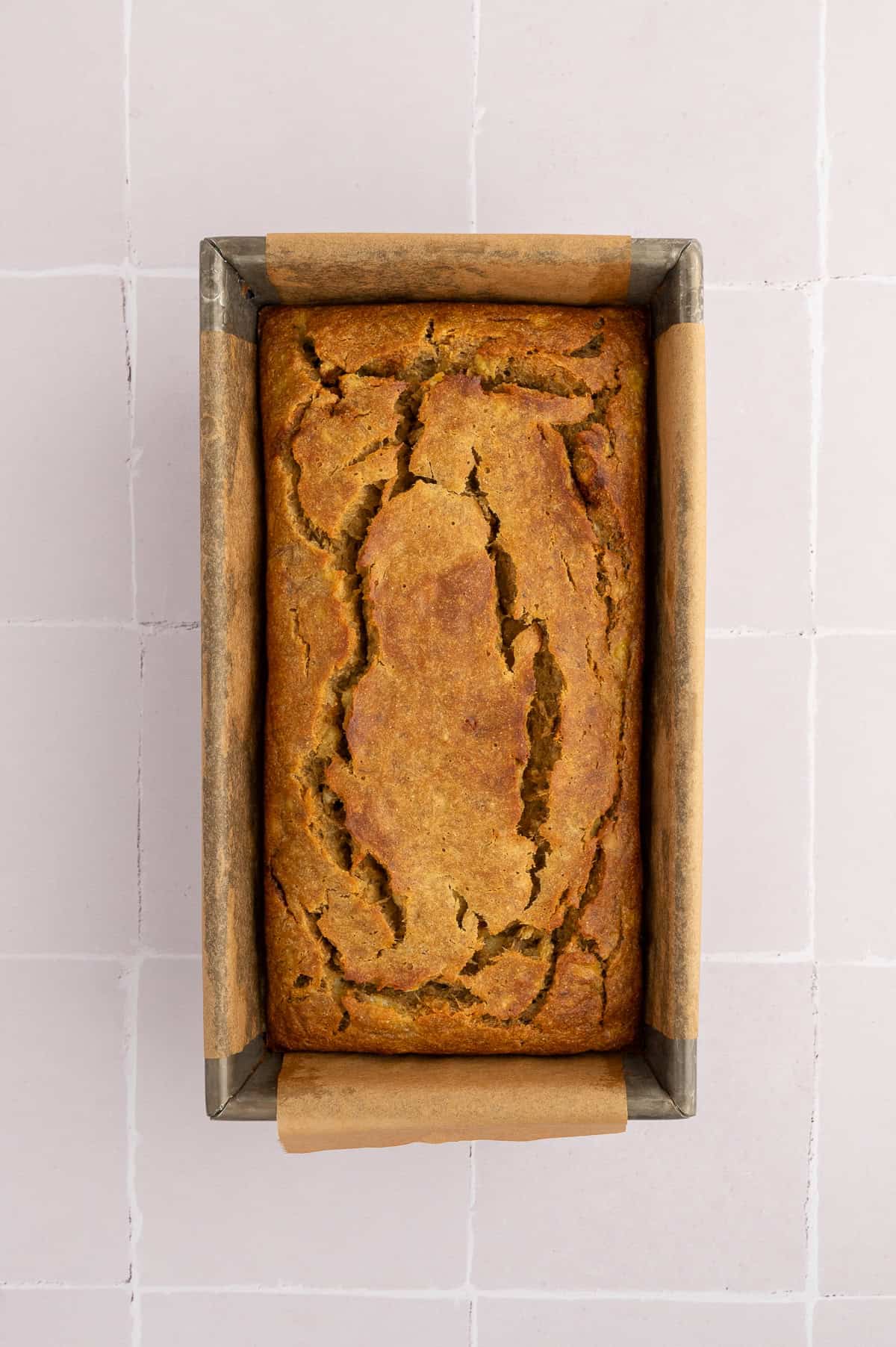 Baked chickpea flour banana bread in a bread pan.