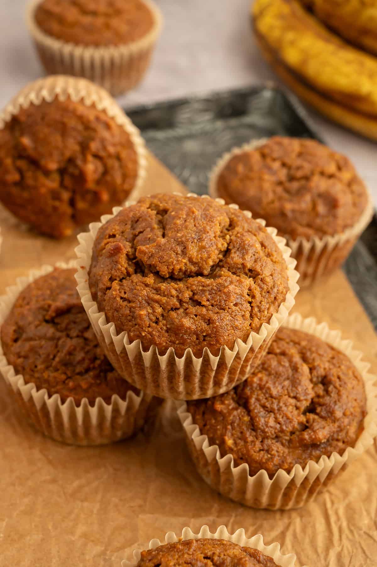 Stack brown paleo banana espresso muffins.