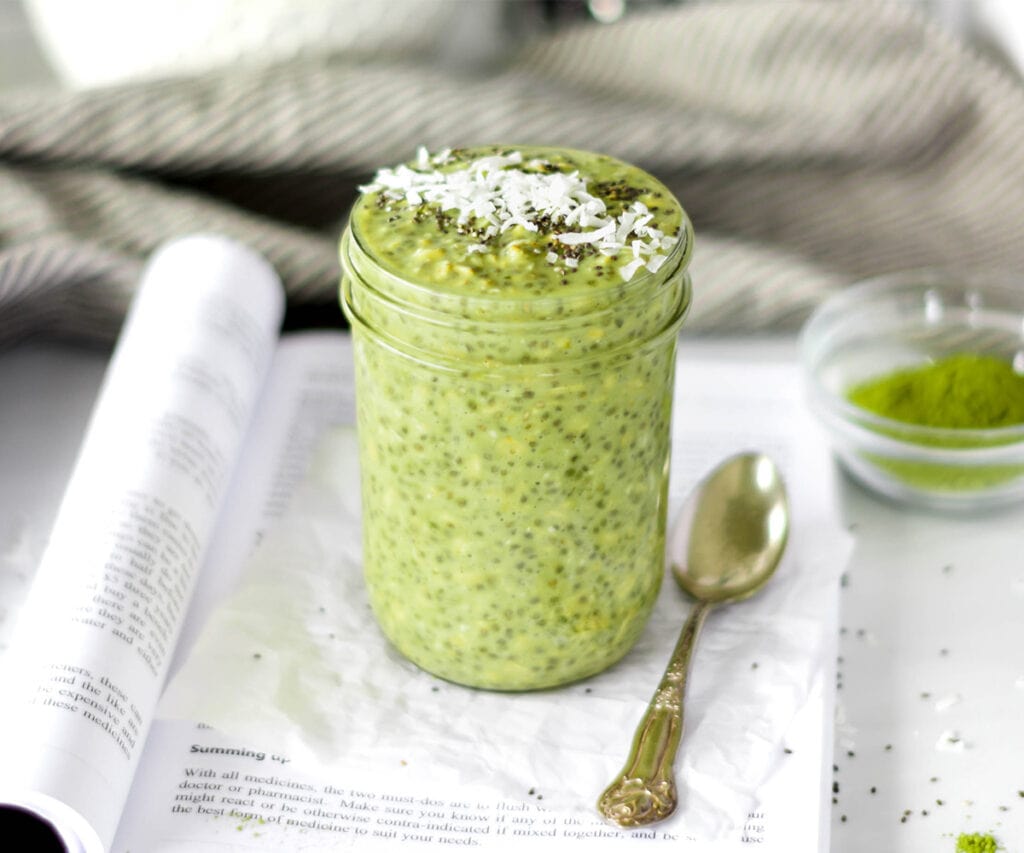 Jar filled with green overnight matcha oats.