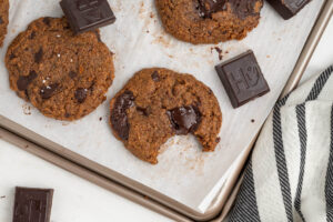 Paleo Flourless Almond Butter Chocolate Chip Cookies with gooey melted chocolate.