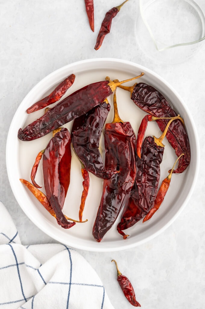 Soaking chilies in a bowl.