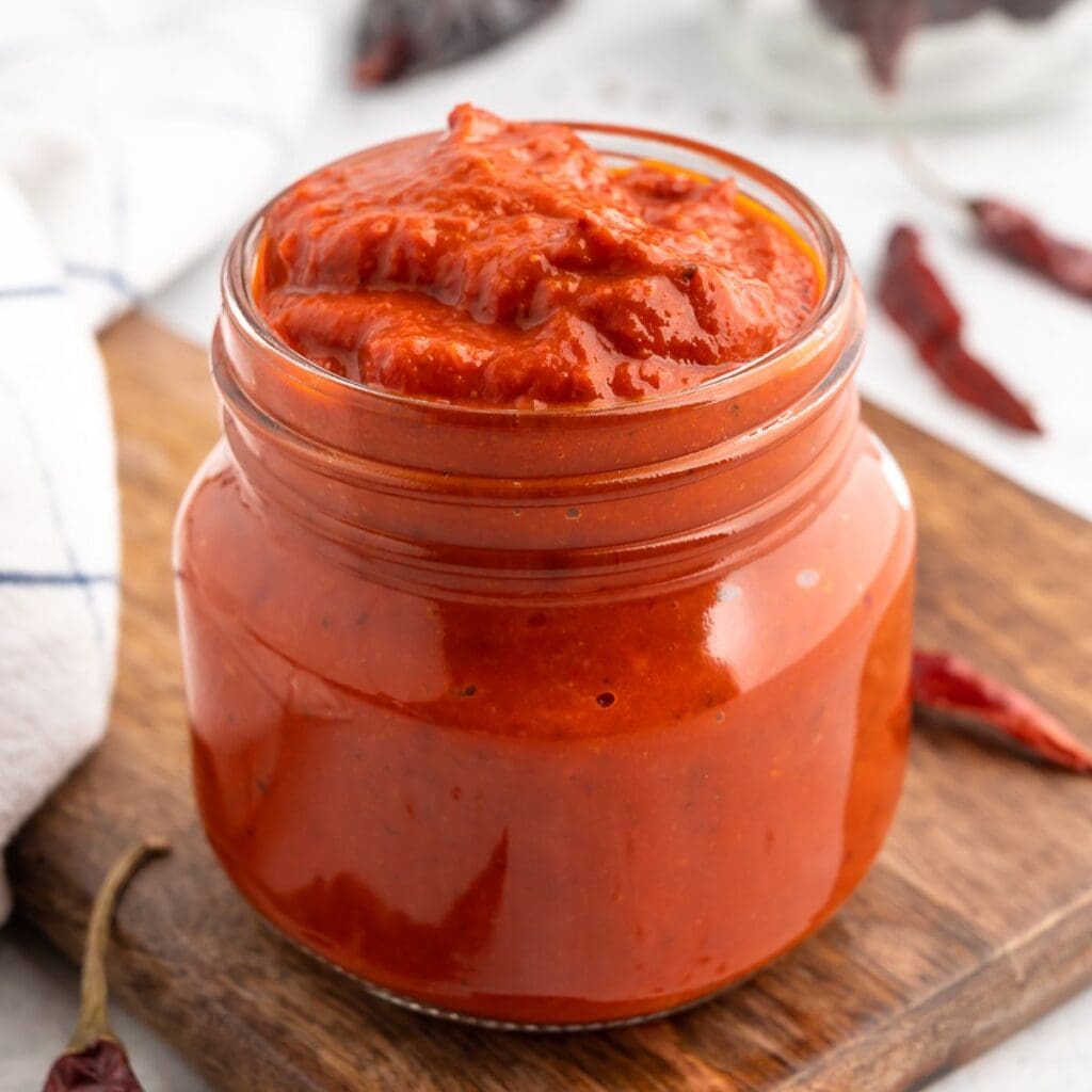 Jar of harissa sauce.