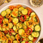 Platter of cucumber and bell pepper salad with everything bagel seasoning.
