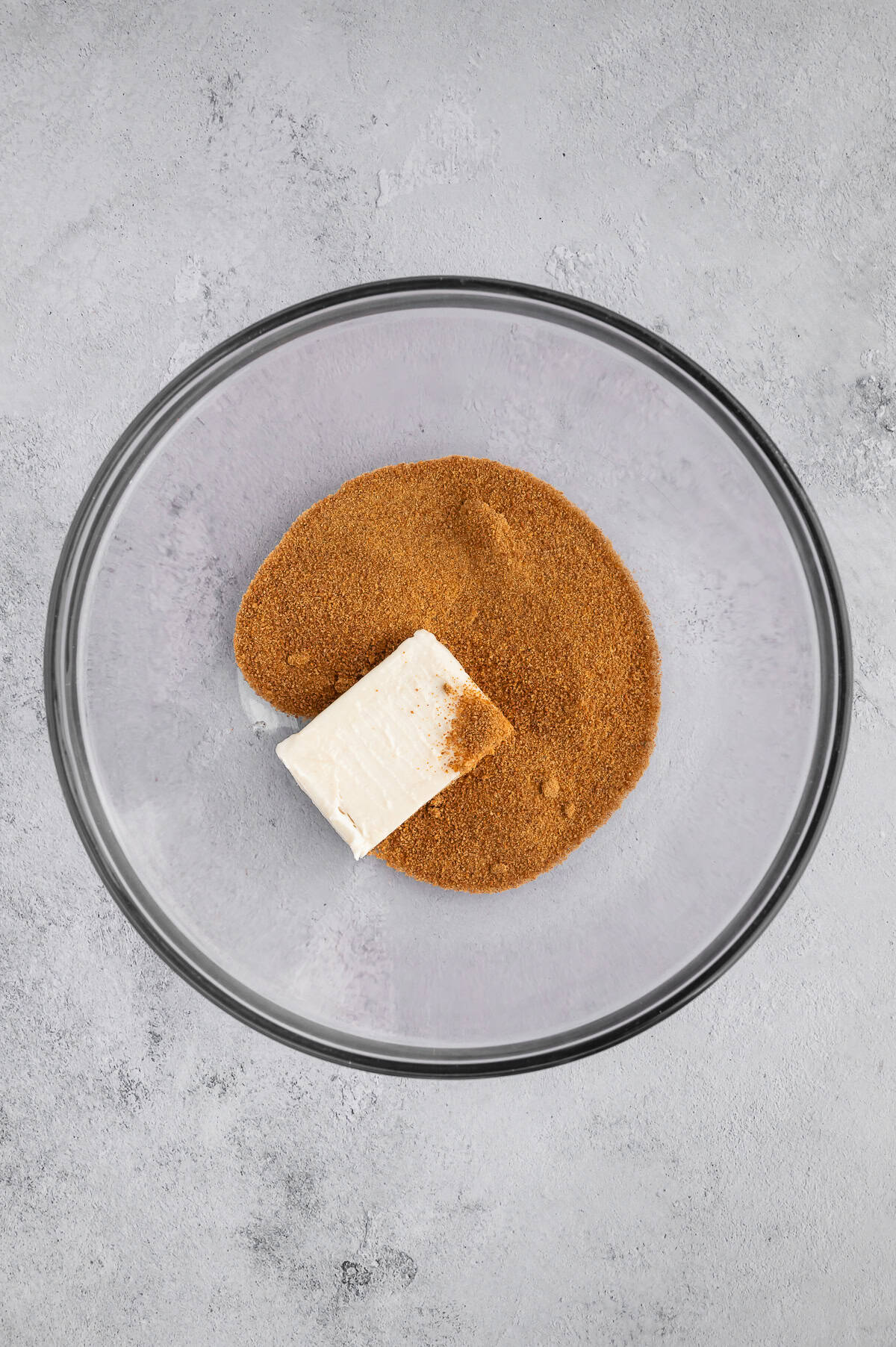 Creaming butter and brown sugar in mixing bowl.