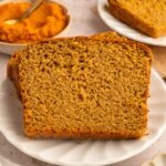 Slices of protein pumpkin bread on a plate.