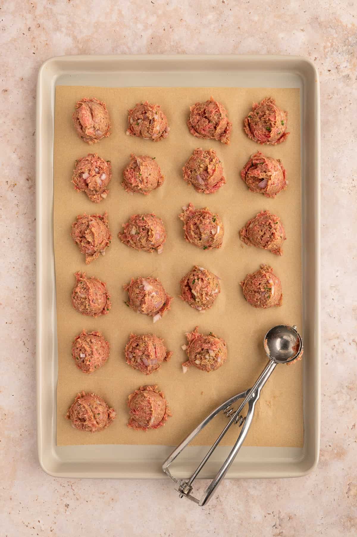 Forming wagyu beef meatballs.