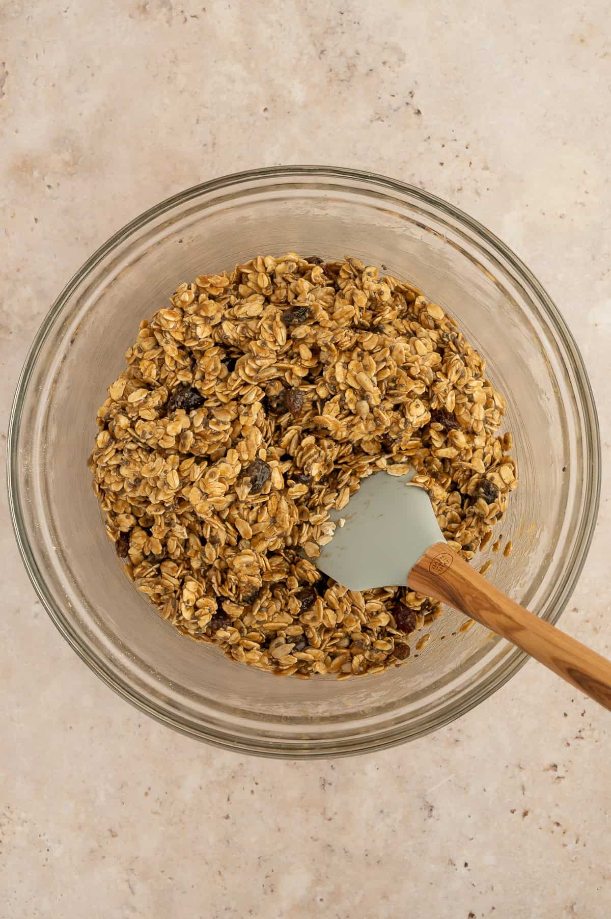 Dry ingredients added to the mixing bowl with wet ingredients.