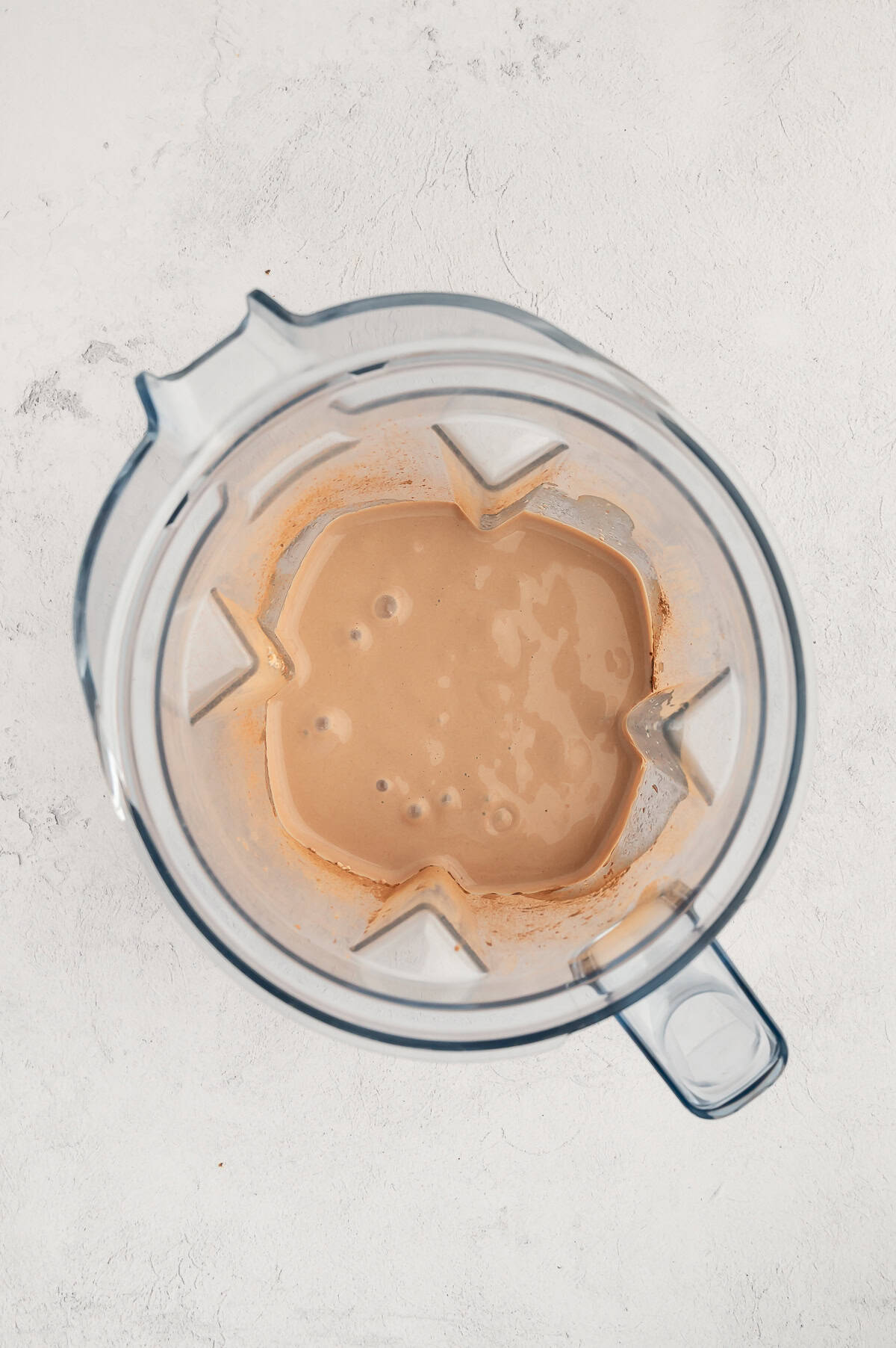 Blended ingredients inside blender.