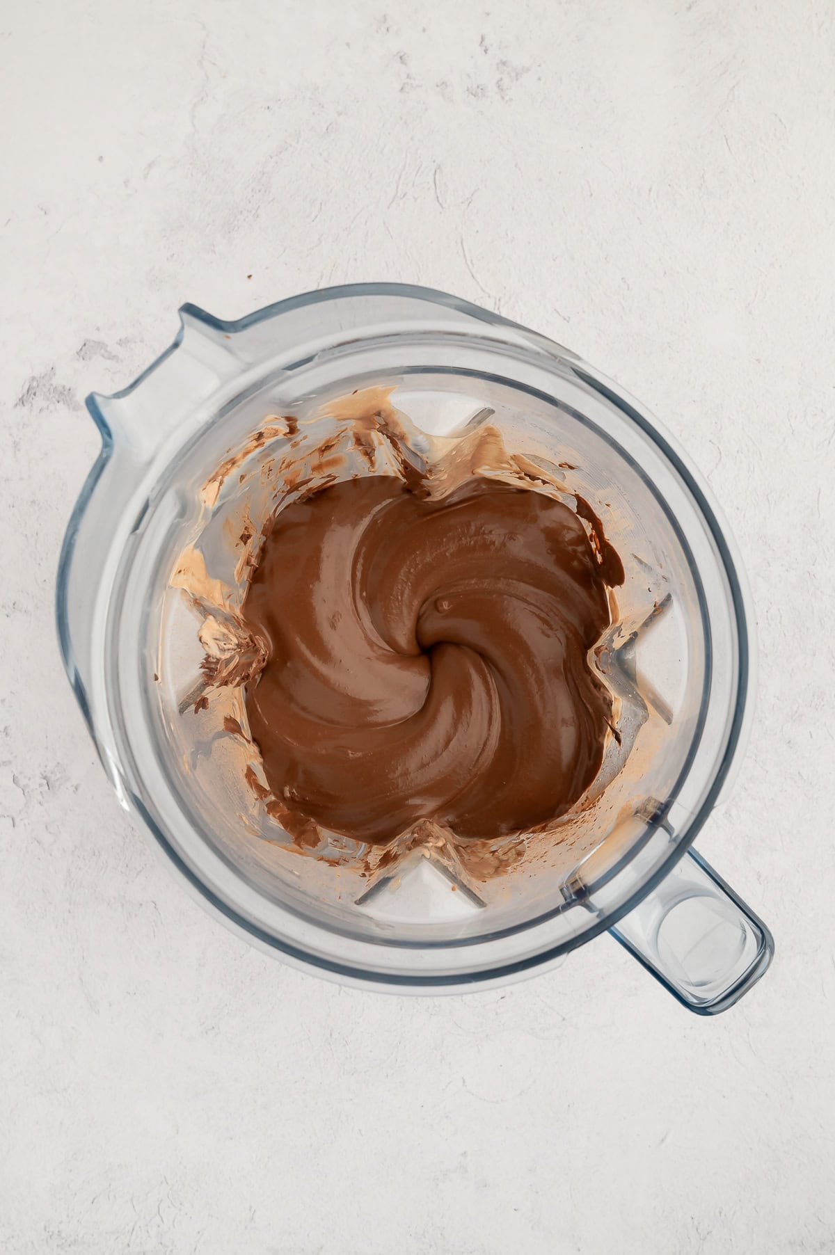 Chocolate blended into cottage cheese mixture.