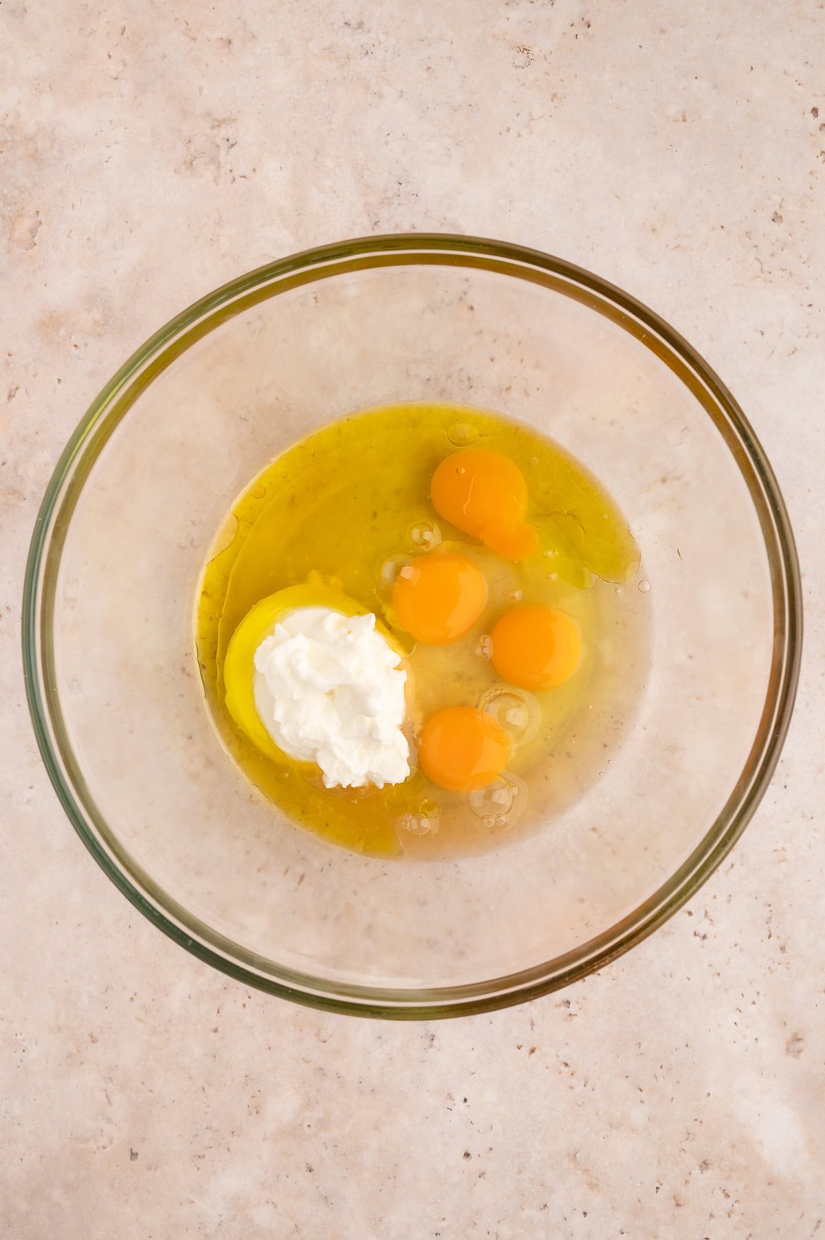 Mixing bowl with wet ingredients for protein pancakes.