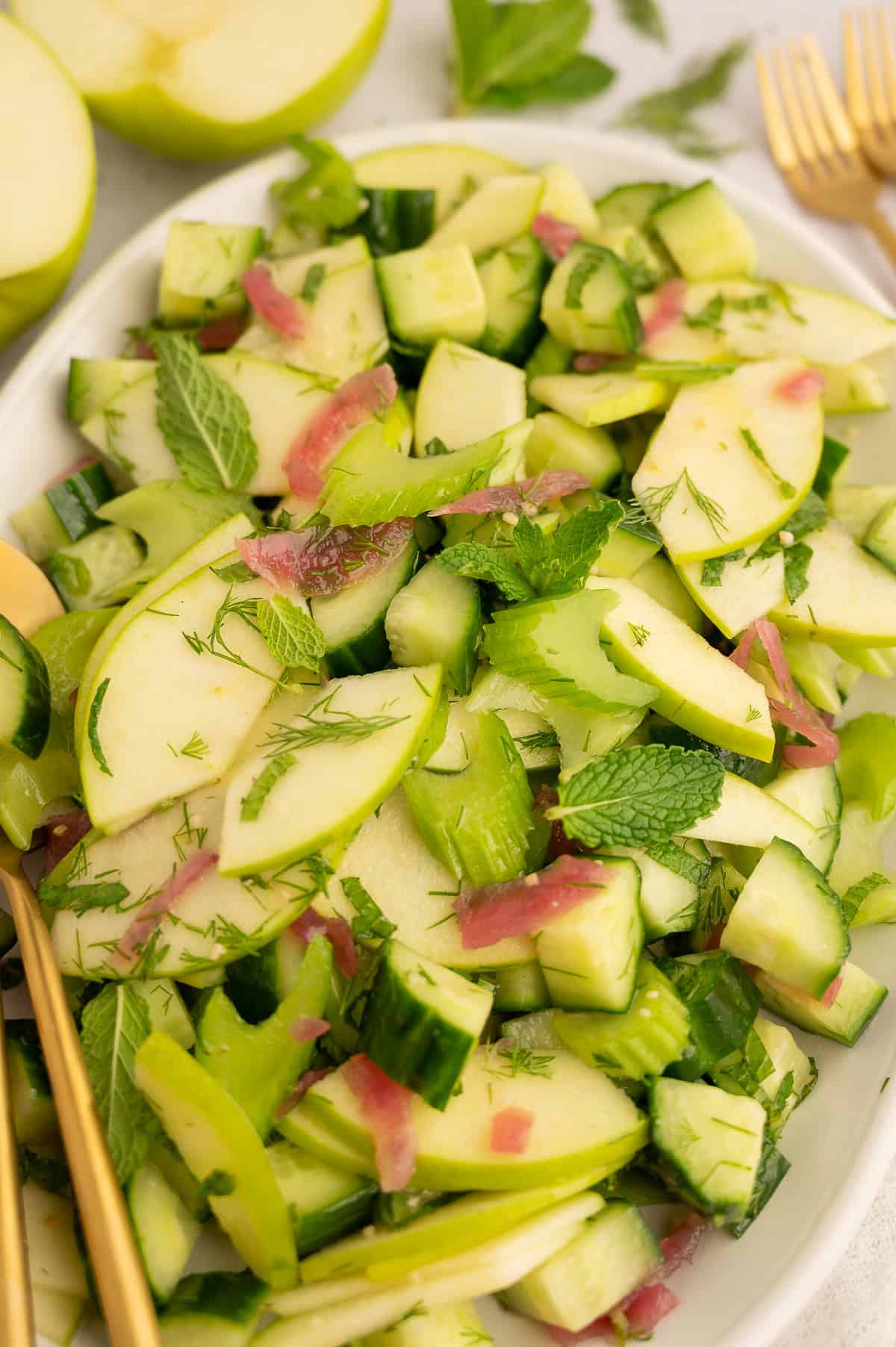 Cucumber celery salad with mint, dill and pickled onion.
